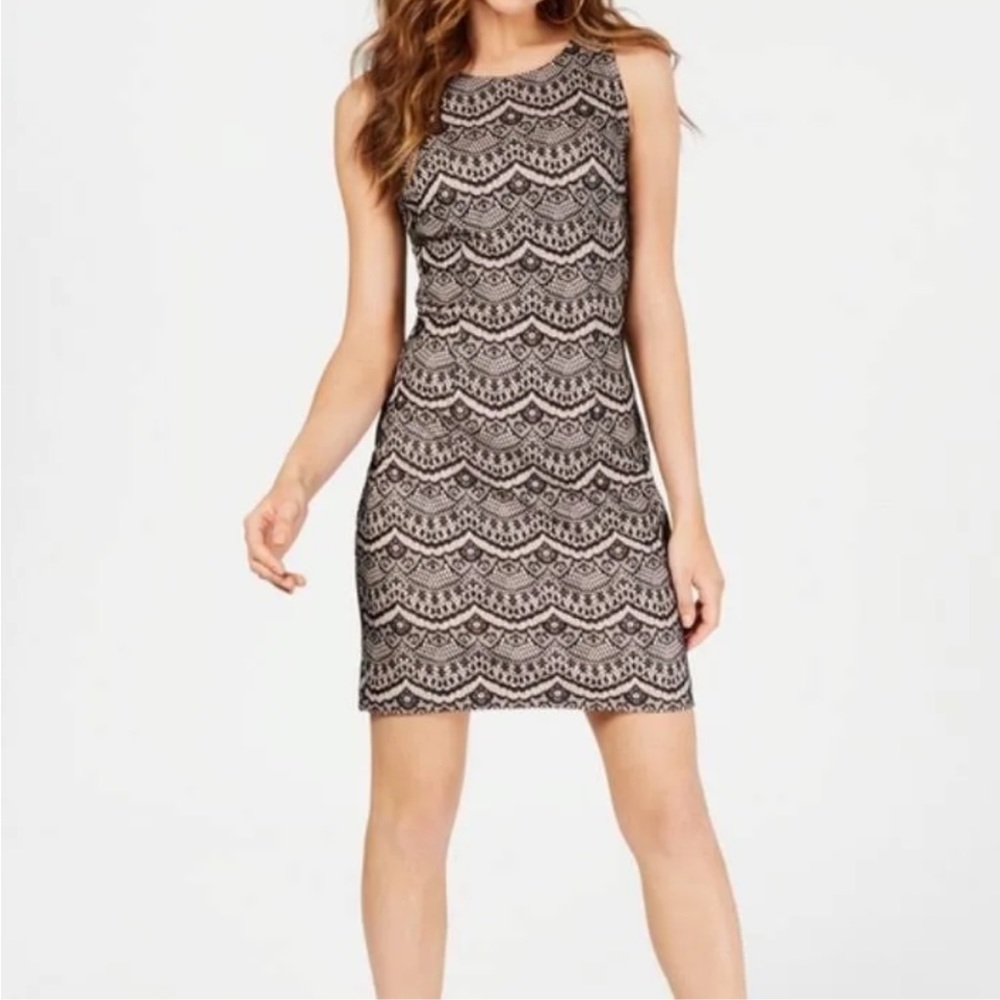 Beautiful Guess dress light pink with black lace pattern size 0 -like new.